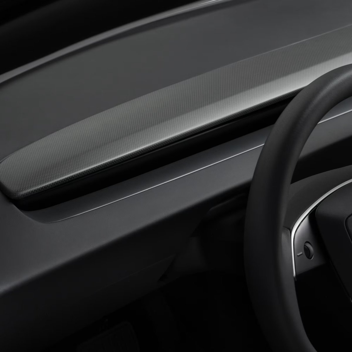 Tesla презентує карбонову накладку торпедо для Model 3